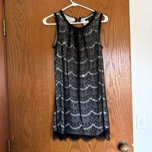 White dress with black lace overlay